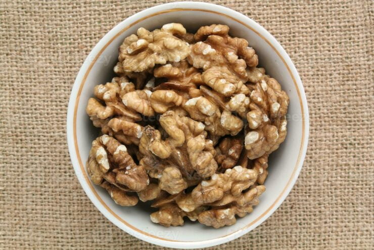 walnut on eco canvas napkin background healthy eating diet nutrition vegan concept protein organic food dry snack national nut day copy space for text photo